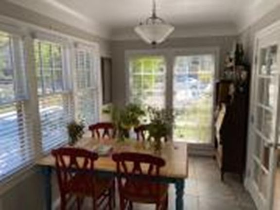 Breakfast Room adjacent to Dining Room and Kitchen with view of street. Lots of light.