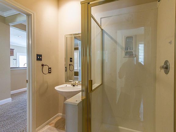 Guest bath downstairs with access to study and entry hallway