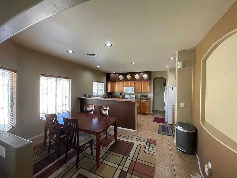 Kitchen and dining room looking in from living room