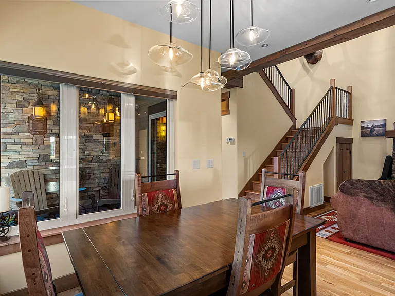 Dinning table converts from 4 to 8 seats with additional matching chairs.