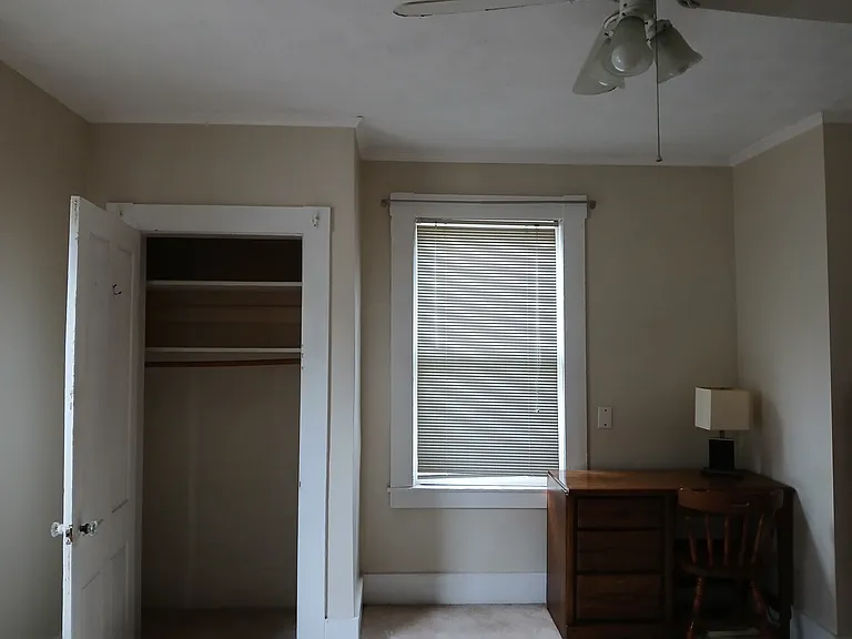 Bedroom closet and ceiling fan