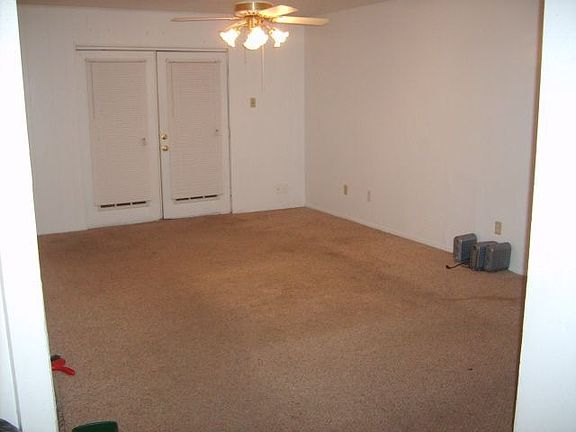 Master bedroom is large and bright with both natural light and ceiling fan.