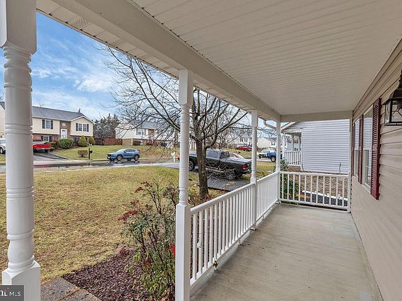 Cozy front porch with new  vinyl railings