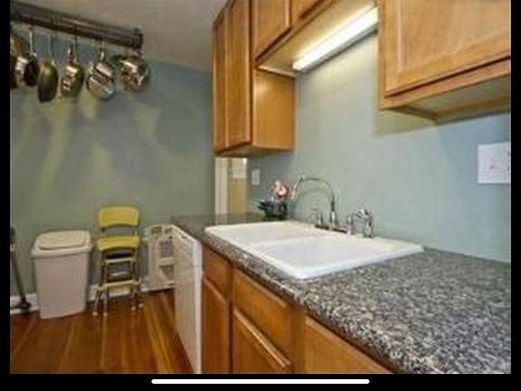 Kitchen with granite counters.