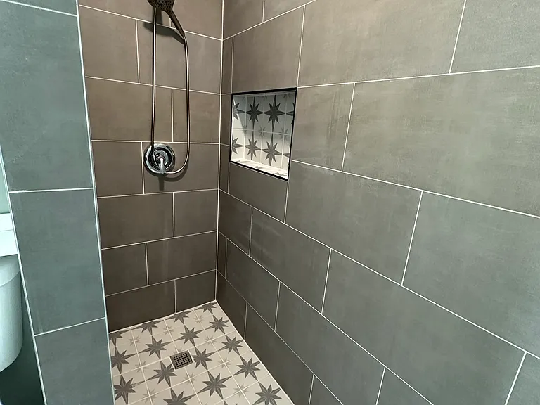 second full bathroom located in the dining room/kitchen area.