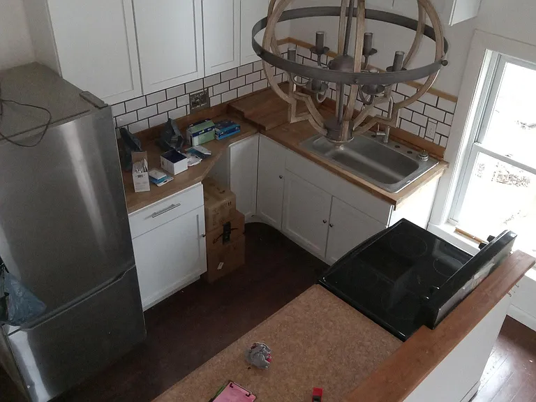 Looking at the kitchen from the loft