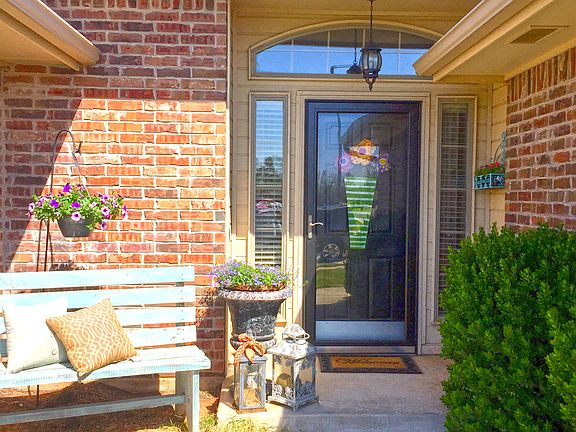 Covered entry w/ storm door