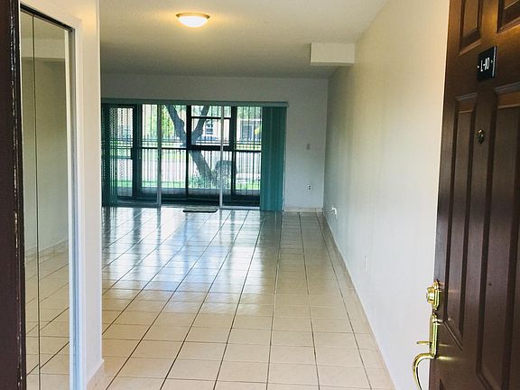 Main Entrance, Foyer, Mirror Closet (left), partial view of 