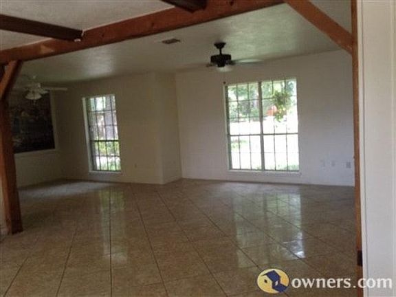 Open floor plan living areas, ceramic tile