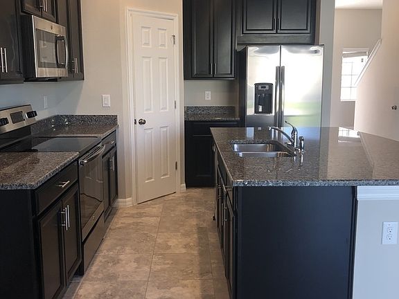 5th image of 7011 Grand Elm Dr