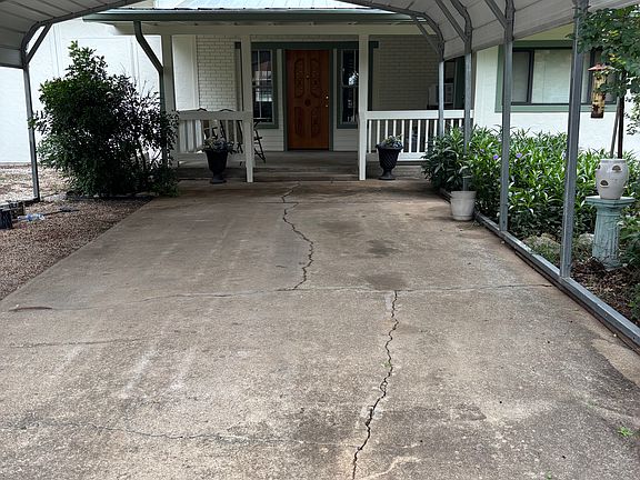 Main Entrance to House with carport