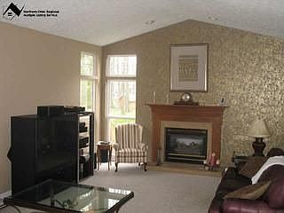 Vaulted Family Room with Cozy fireplace