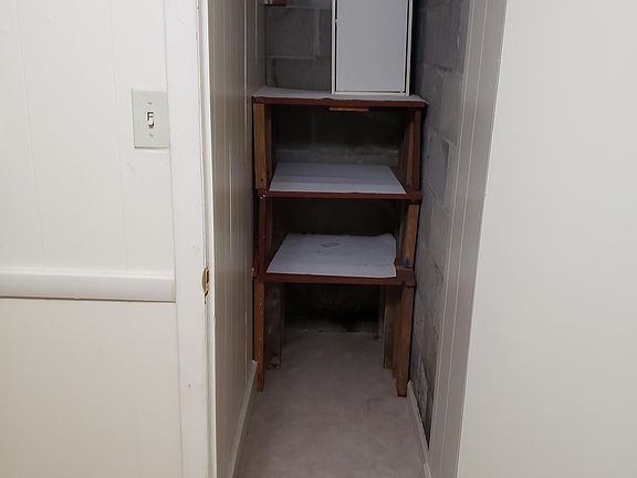 walk in lighted pantry off of the dining area.