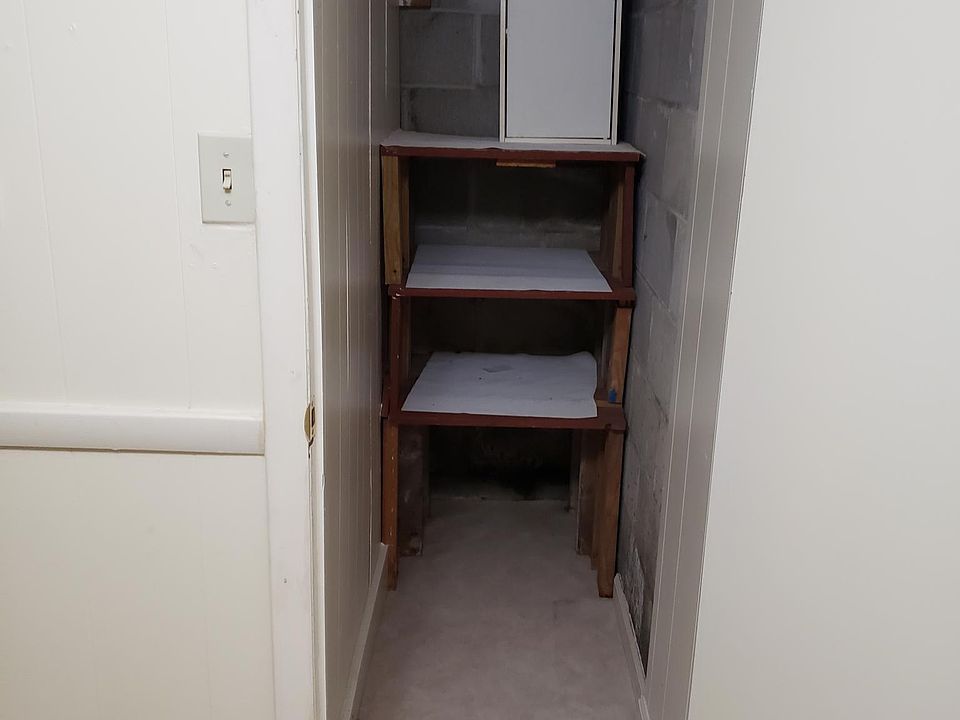walk in lighted pantry off of the dining area.