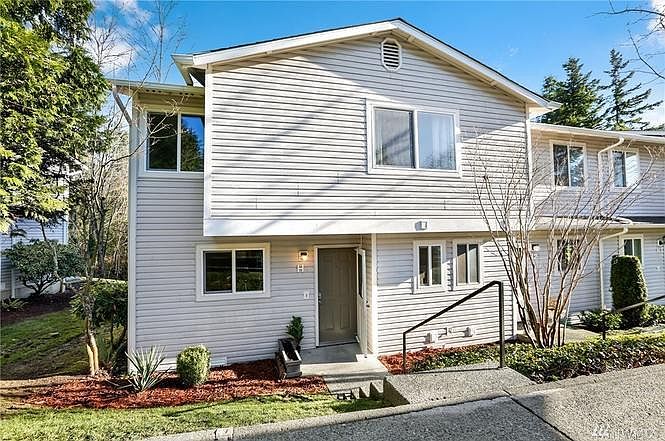 Two story end unit condo, front of property.