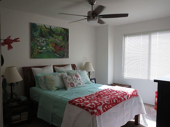 Master bedroom with ceiling fan, huge closet, bathroom