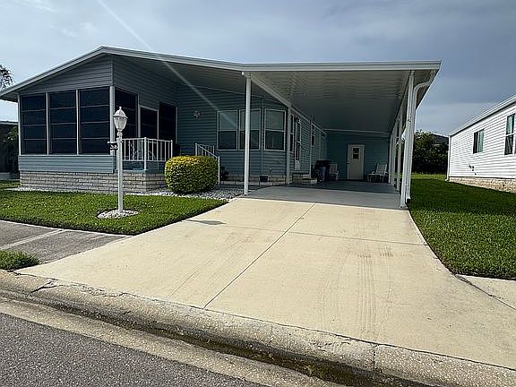 New carport & large driveway
