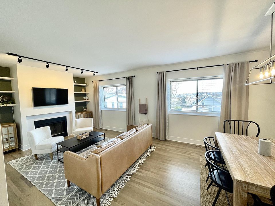Beautiful hardwoods, natural light, fireplace, and open floor plan