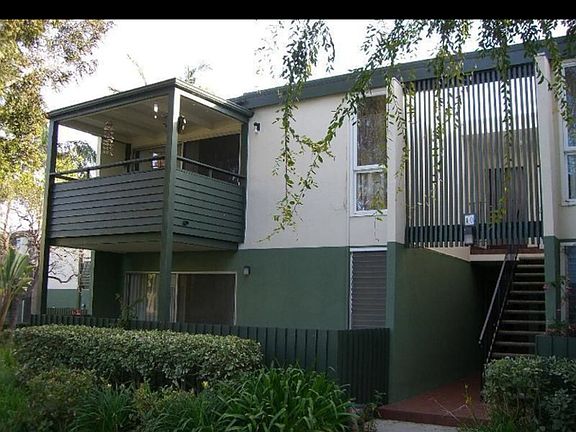 Corner upstairs unit.