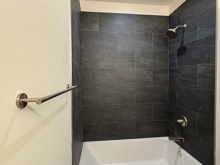 Bathtub in second bathroom