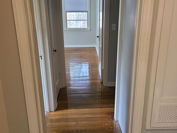 Hallway to bathroom and bedroom