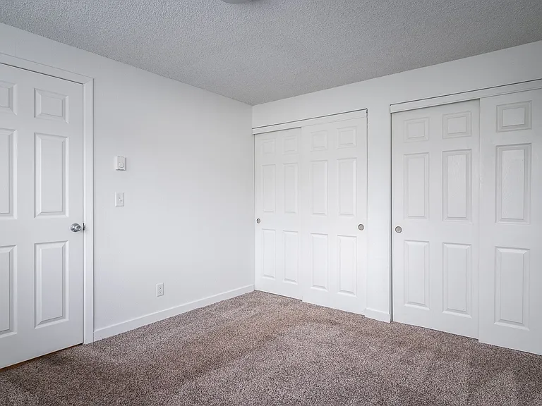Riverwood | Bedroom with Double Closet Doors