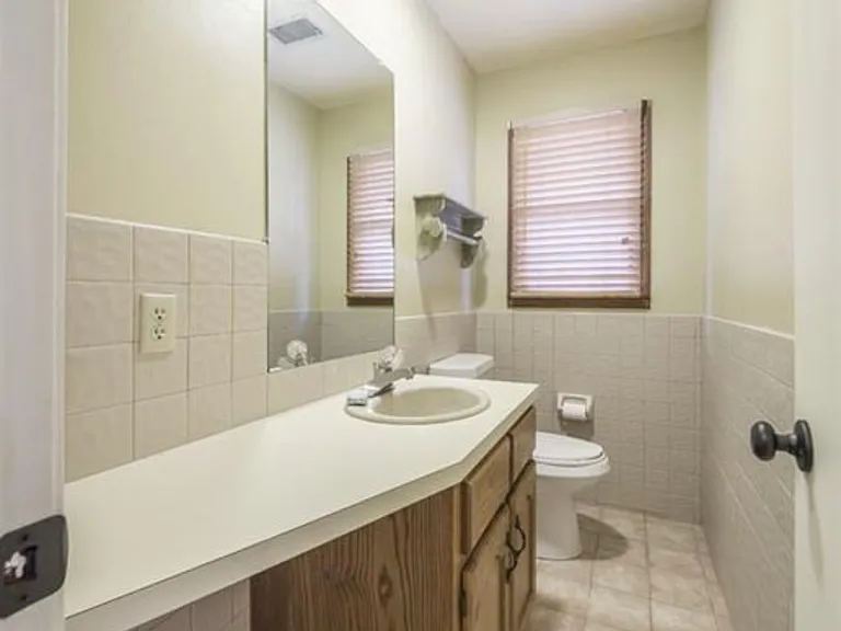 Downstairs main floor extra bath (toilet and sink only)