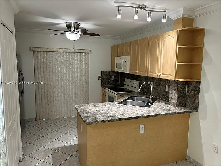 10919 W Okeechobee Rd #101 — Photo 5