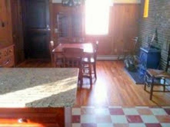 Dinning Rm-Wood Fireplace