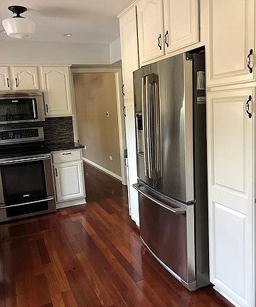 5th image of 9840 N Hickory Ln