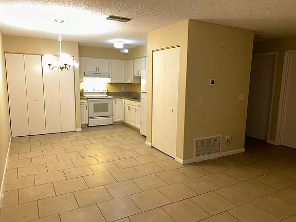 View of the dining room and laundry hook ups