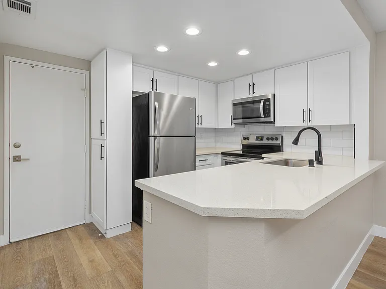 Cook, dine, and gather in a stylish kitchen space.