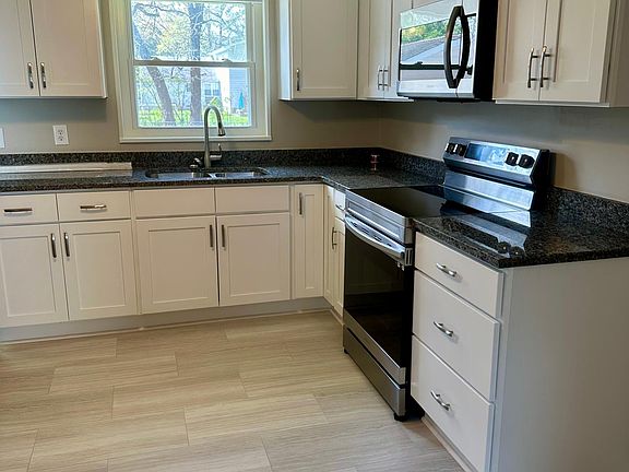 Updated Kitchen with Granite
*(Floor in process of being replaced)
