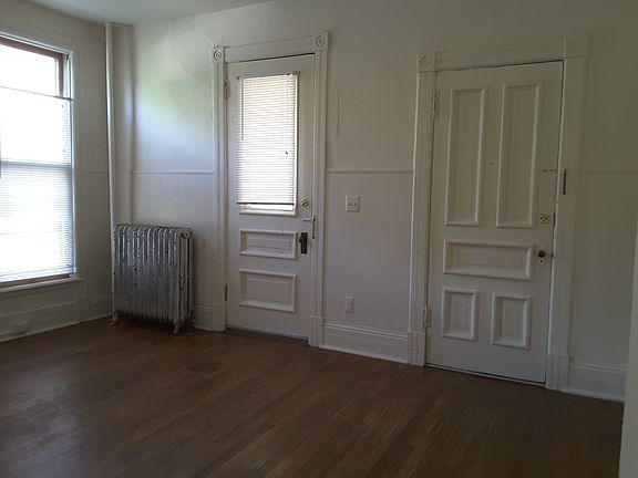 Living room facing South. Wood floor.