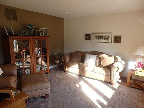 Formal living room in front of home, could also be den.