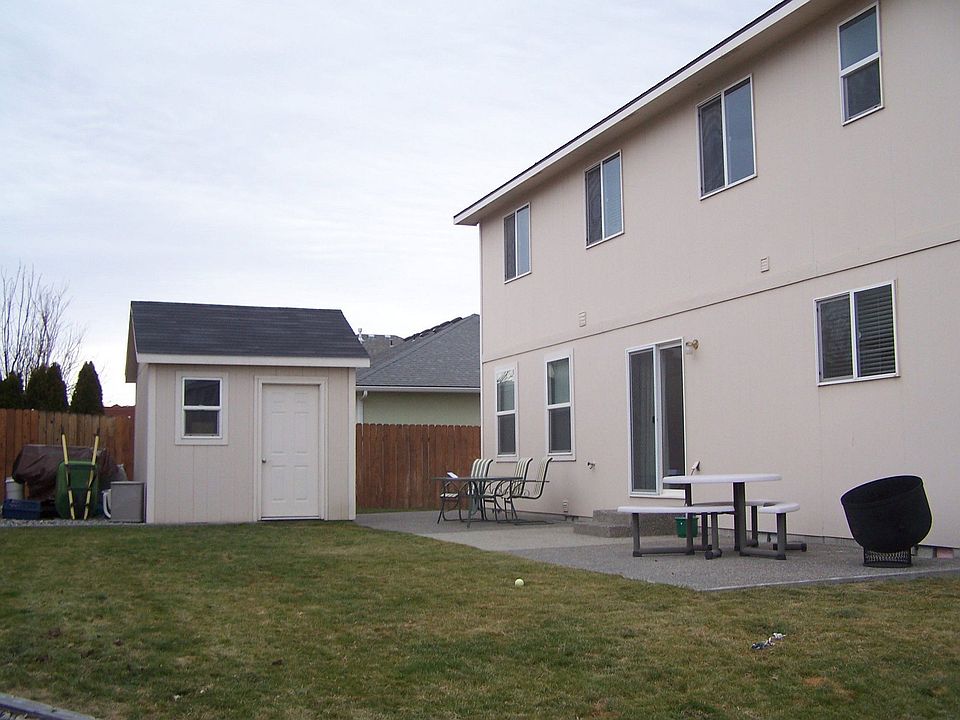 Large, Fenced Rear Yard with Detached Shop