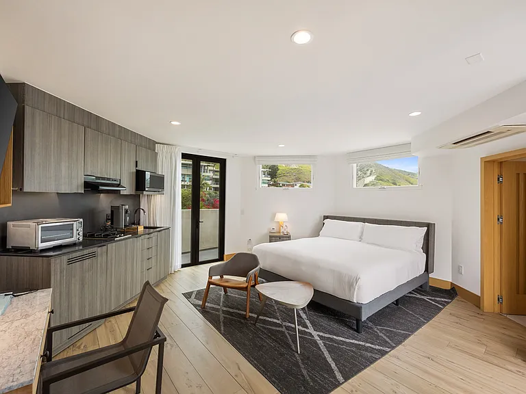 Experience a peaceful ambiance complemented by natural light and serene views, perfect for unwinding during your stay.