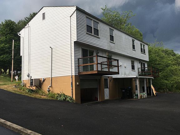 Safe, Quiet Community with Deck to relax and area to play, also garage w/ opener