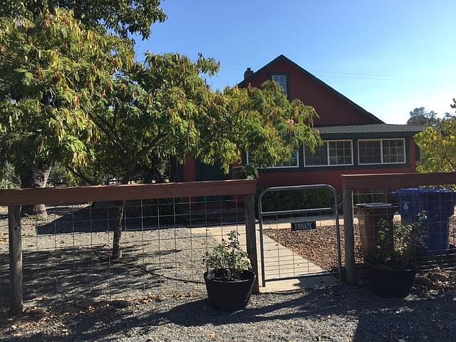 Gated access to mudroom/laundry porch from parking spot