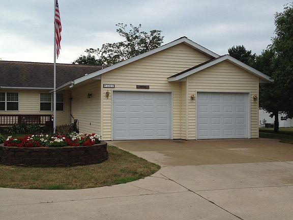 Entrance and 2-car garage