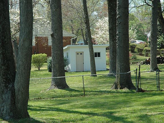 Back yard with wood shed
