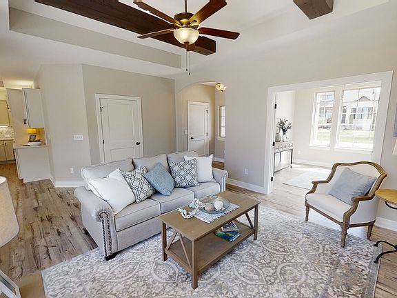Spacious Living Room with Large Picture Windows