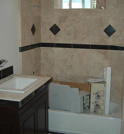 downstairs bath travertine tile