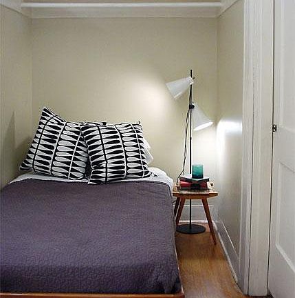 Walk in closet large enough for a twin sized bed or a desk/office area.