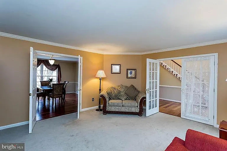 Living Room has doors into the center hallway and into the dining room, the living room has been repainted.