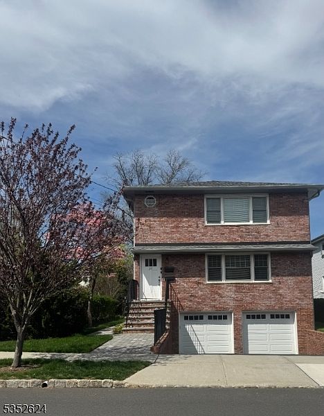 Beautiful perfectly & totally renovated 2nd floor apartment with washer/dryer and garage. Steps to Town, Train, Park and Millburn schools.