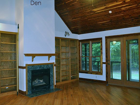 Main living area, 18 ft cedar ceilings, hardwood floors
