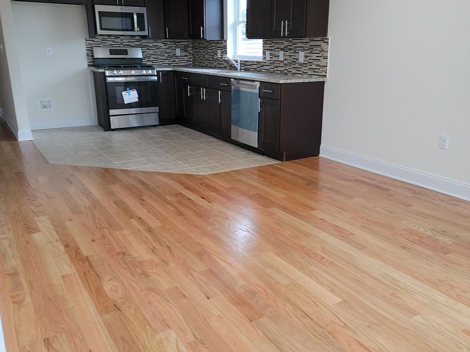Kitchen and living area. Brand new LG refrigerator provided.