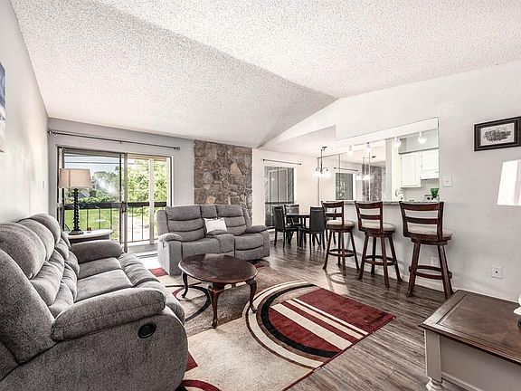 Gather the family and guests together in your living room! Featuring high ceilings, gorgeous floors, and large windows that provide plenty of natural lighting throughout the day!