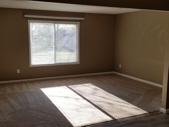 Large Living Room - New Carpet and Kitchen Flooring